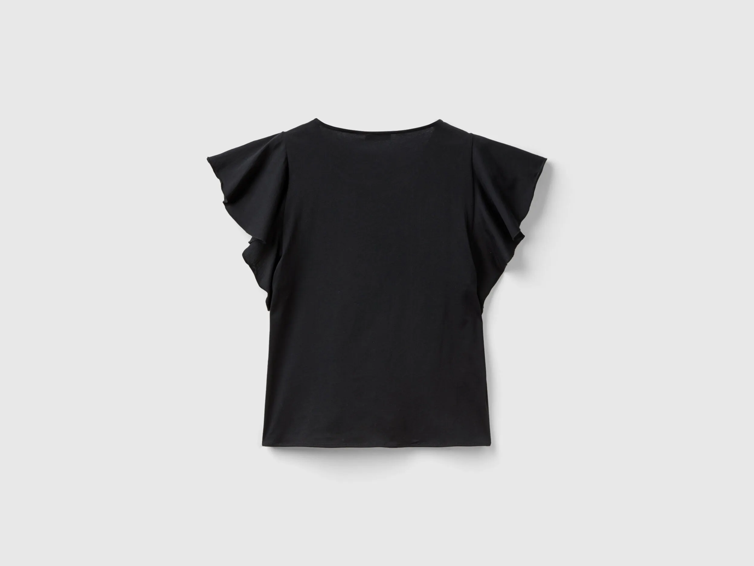 Camiseta con flores bordadas
