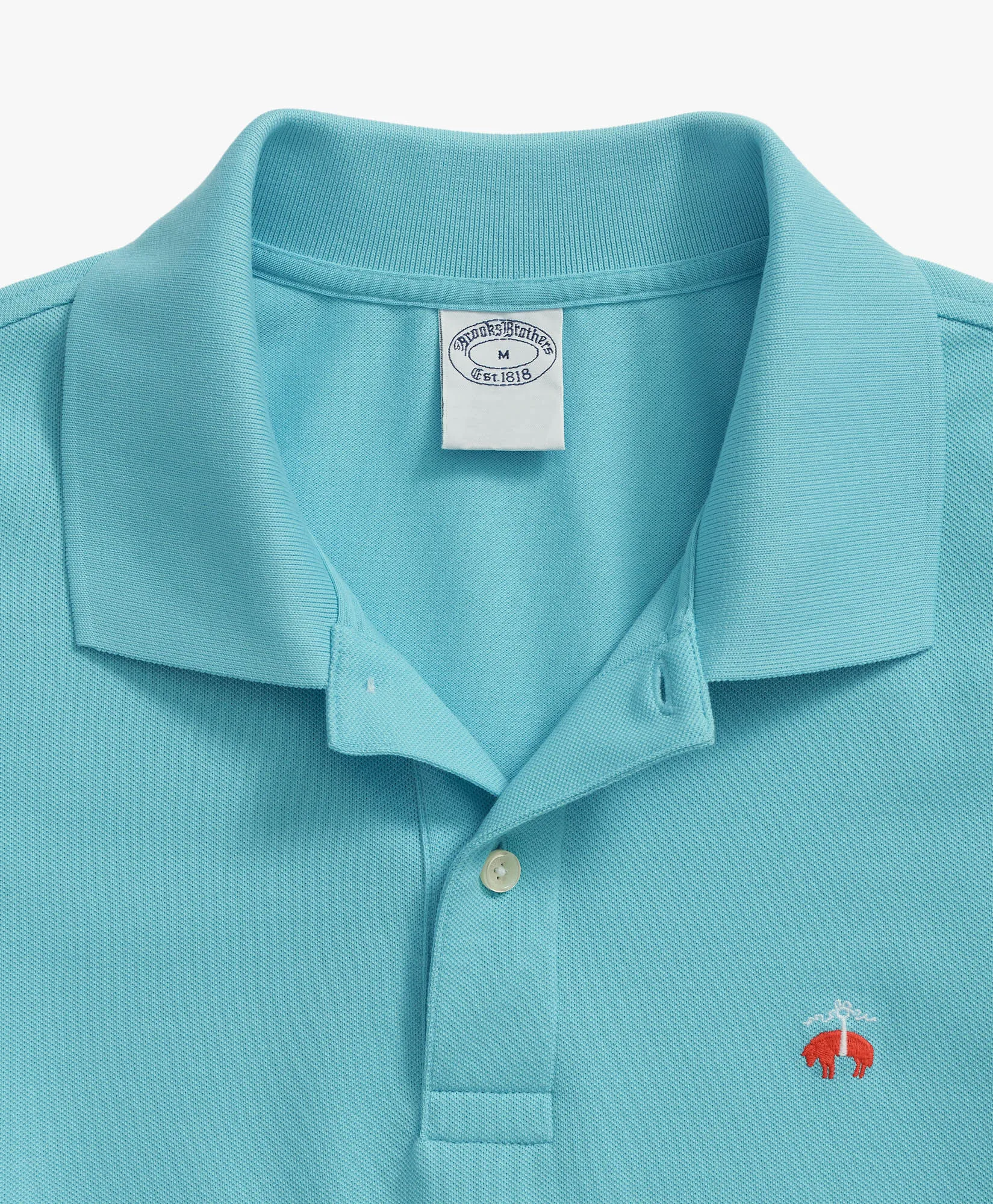 Polo Golden Fleece slim fit en Supima elástico